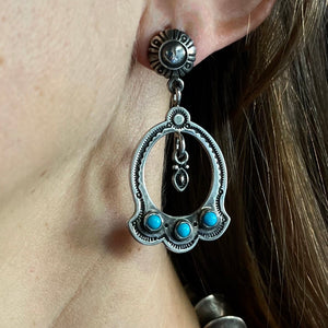 Three Stone Hoops<br>By Clendon Pete