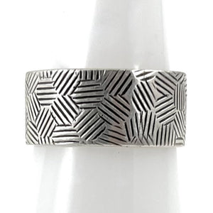 Silver Band Ring<br>By Norbert Peshlakai<br>Size: 7.5