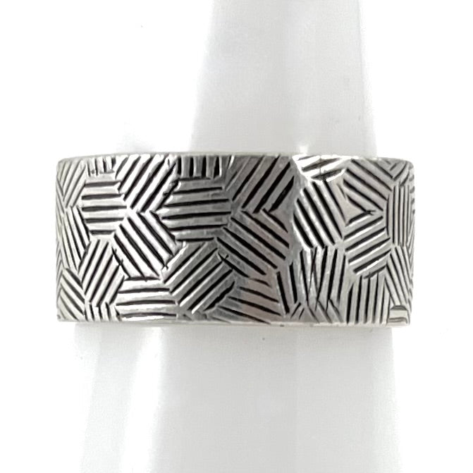 Silver Band Ring<br>By Norbert Peshlakai<br>Size: 7.5