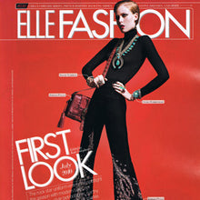 Load image into Gallery viewer, ELLE JULY 2010 The rock star uniform Navajo jewelry
